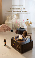 Raindrop Humidifier & Aroma Diffuser – 250ml Rotating Music Box with LED Light